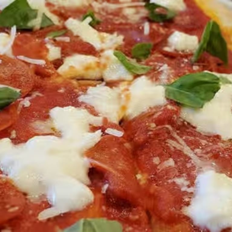 Indulge in Quattro Formaggi Pizza